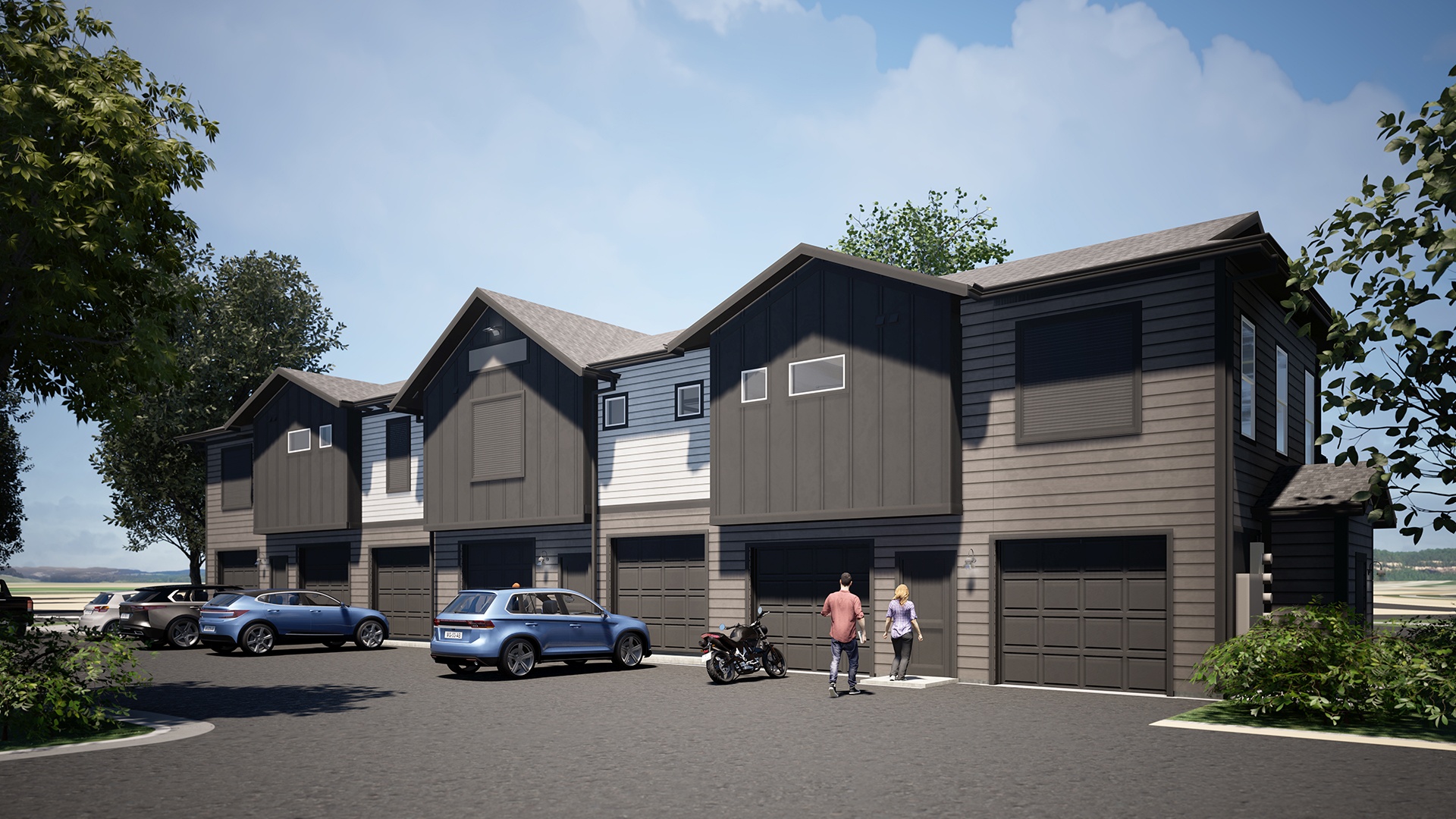A modern house with a grey exterior and a black garage door.